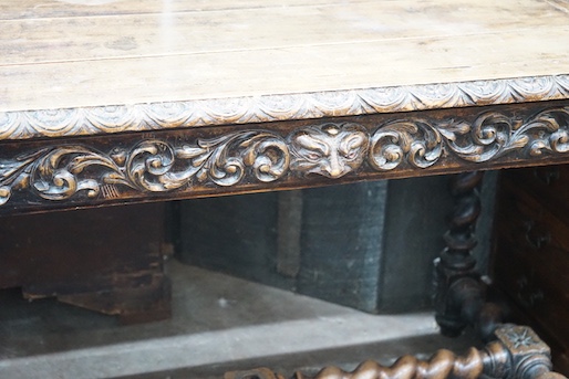 A 19th century Flemish rectangular carved oak side table, width 110cm, depth 65cm, height 74cm